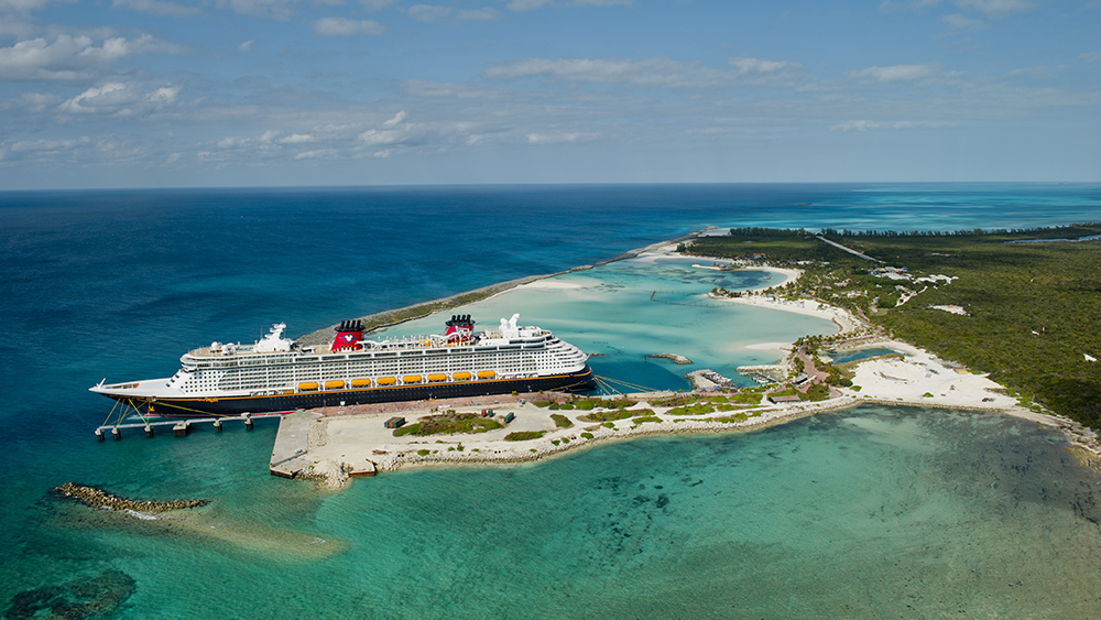 A Disney Cruise ship moored at Disney Castaway Cay